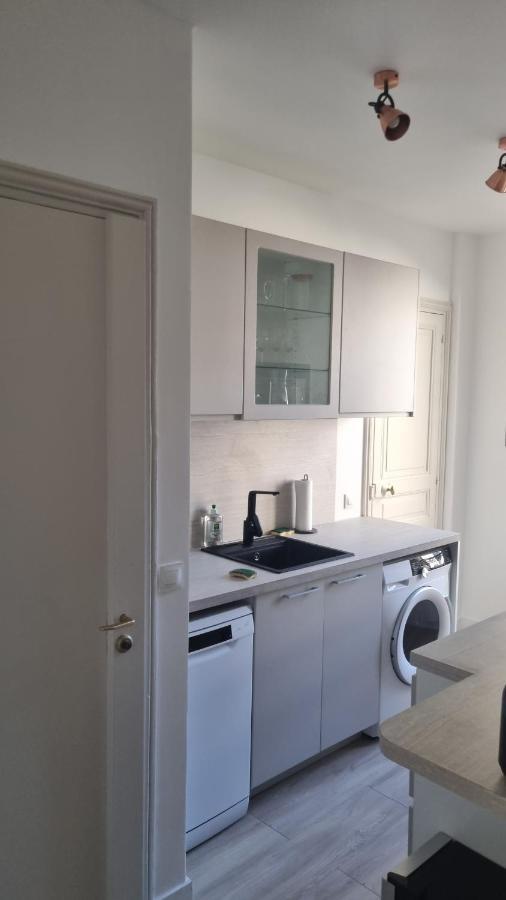 Appartement Luxueux Dans Maison Bourgeoise Parisienne 르발루아페레 외부 사진
