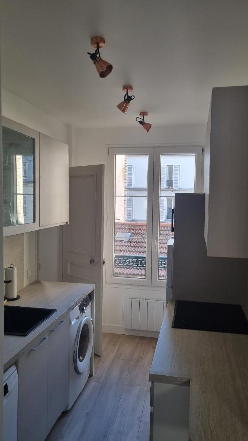 Appartement Luxueux Dans Maison Bourgeoise Parisienne 르발루아페레 외부 사진