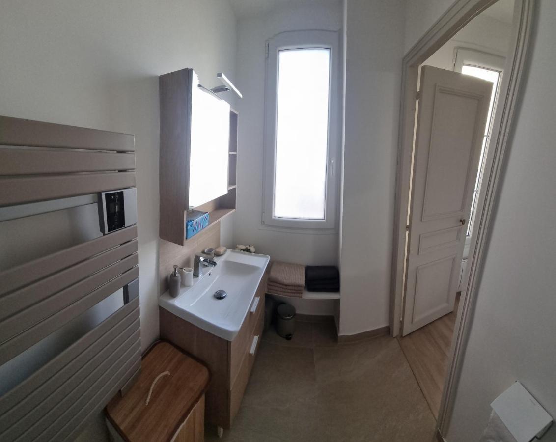 Appartement Luxueux Dans Maison Bourgeoise Parisienne 르발루아페레 외부 사진