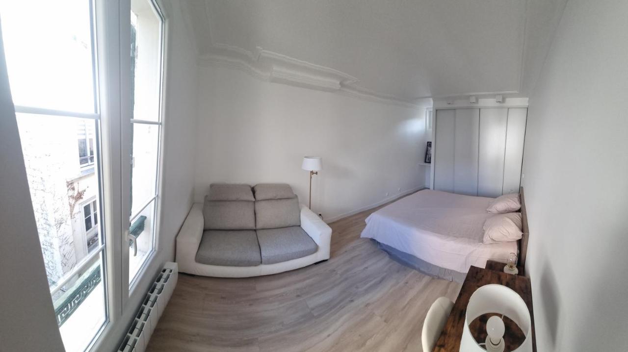 Appartement Luxueux Dans Maison Bourgeoise Parisienne 르발루아페레 외부 사진